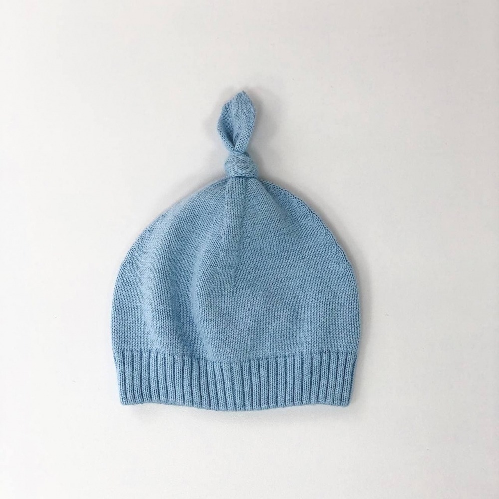 Шапочки, хустинки. Шапочка вязана з помпоном 39 блакитний 1039907