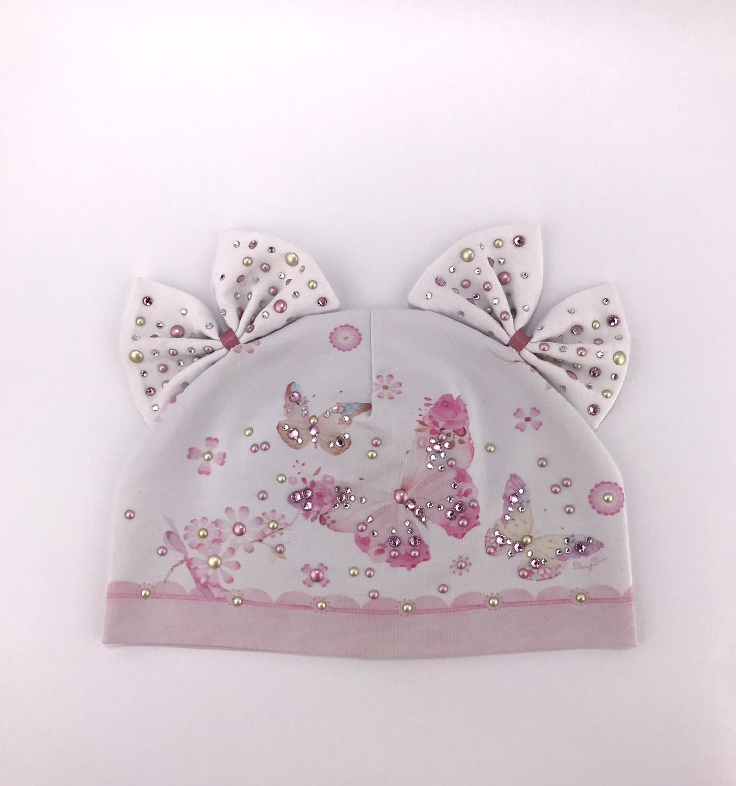 Головні убори і шарфи. Шапка для дівчинки з вушками білий 3003-1036