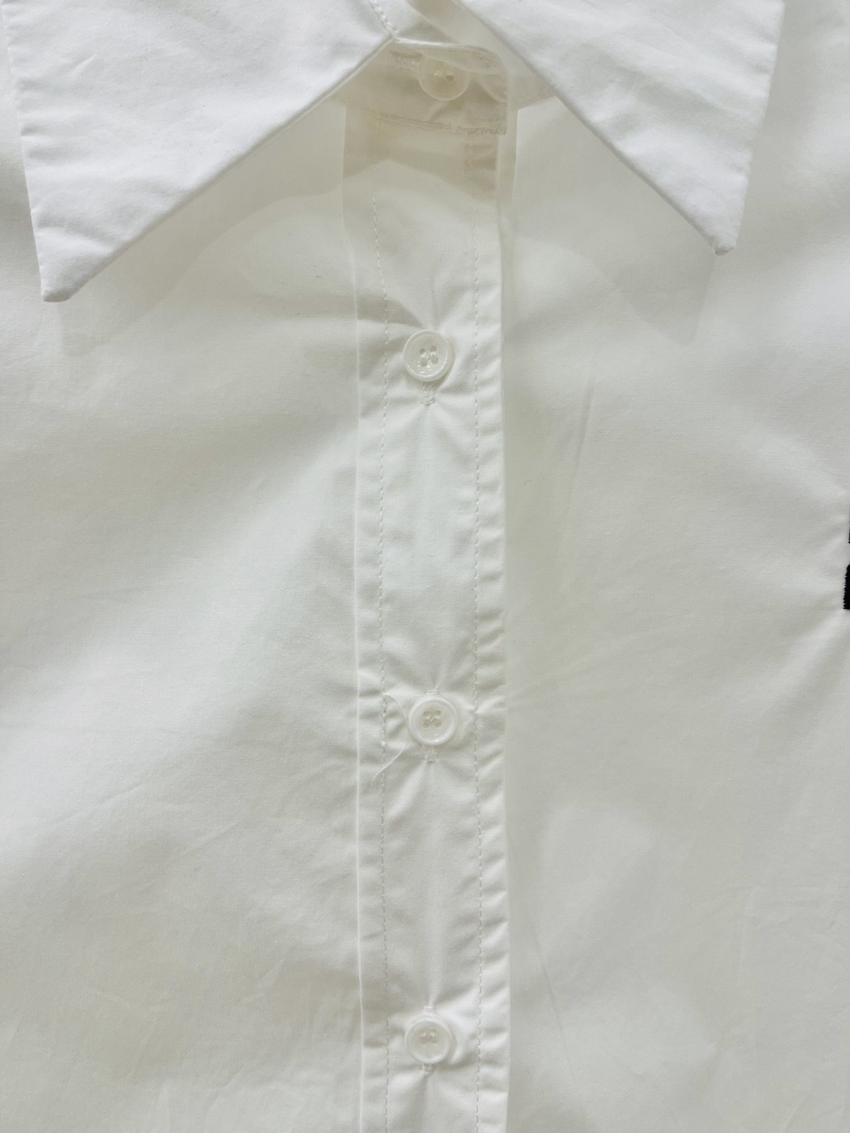 Блузи і сорочки. Сорочка вкорочена для дівчинки д.р білий 95253