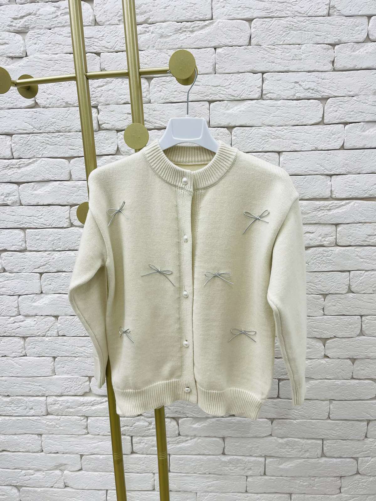 Кофта для дівчинки з бантиками молочний 1010-1717